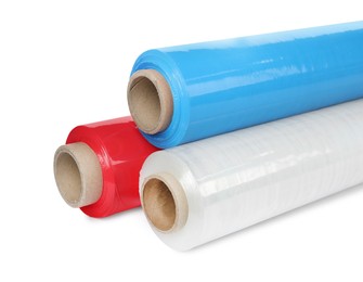 Photo of Different plastic stretch wrap films on white background, closeup