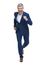 Photo of Mature businessman in stylish clothes posing on white background