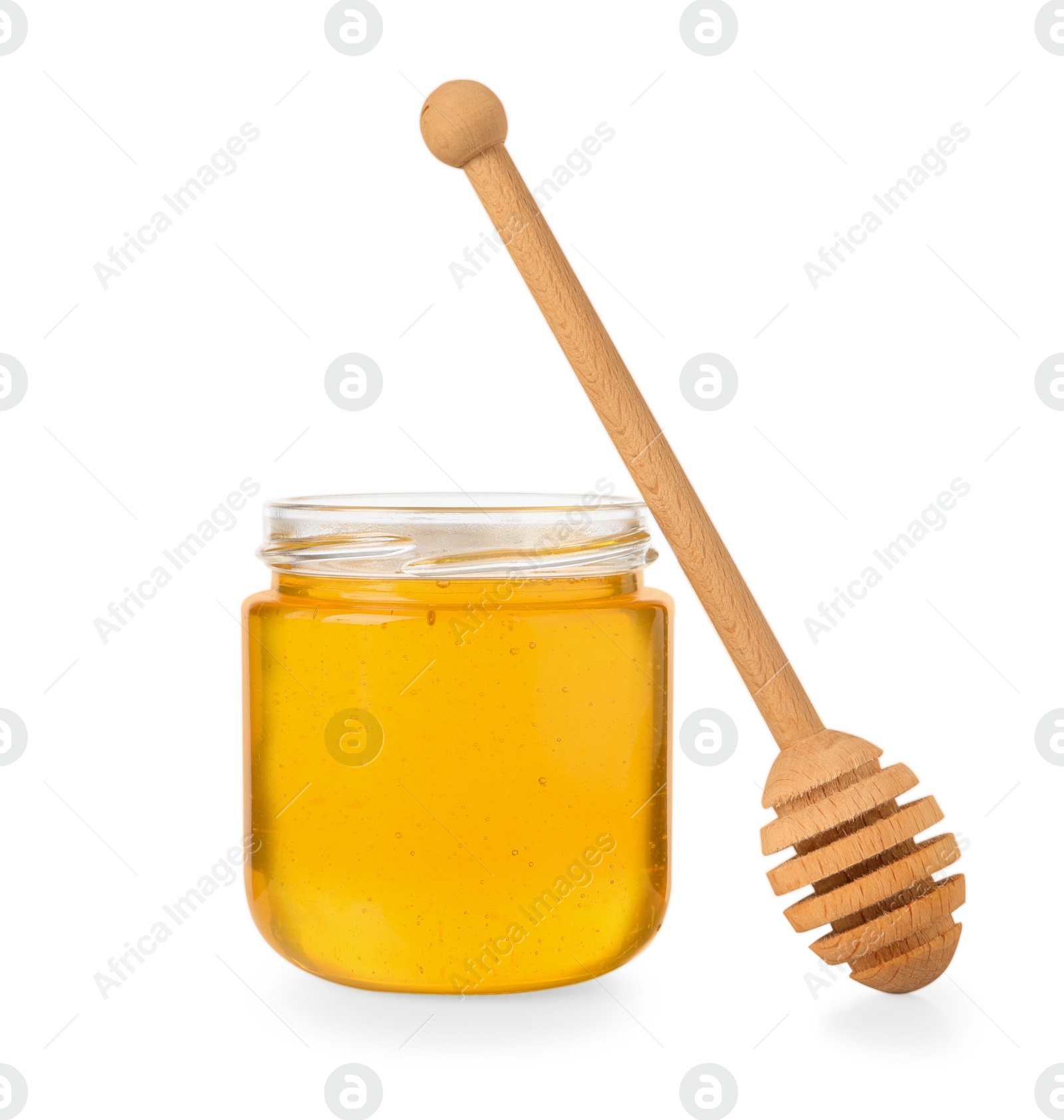 Photo of Tasty honey in glass jar and dipper isolated on white