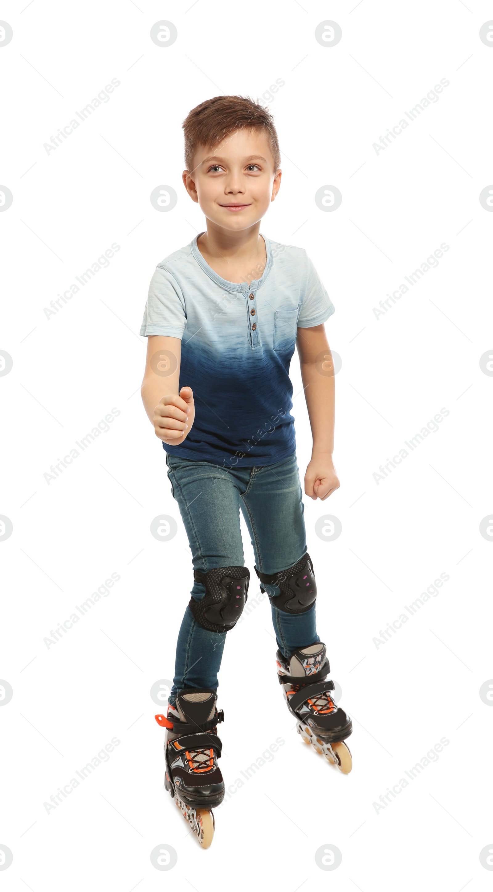 Photo of Little boy with inline roller skates on white background