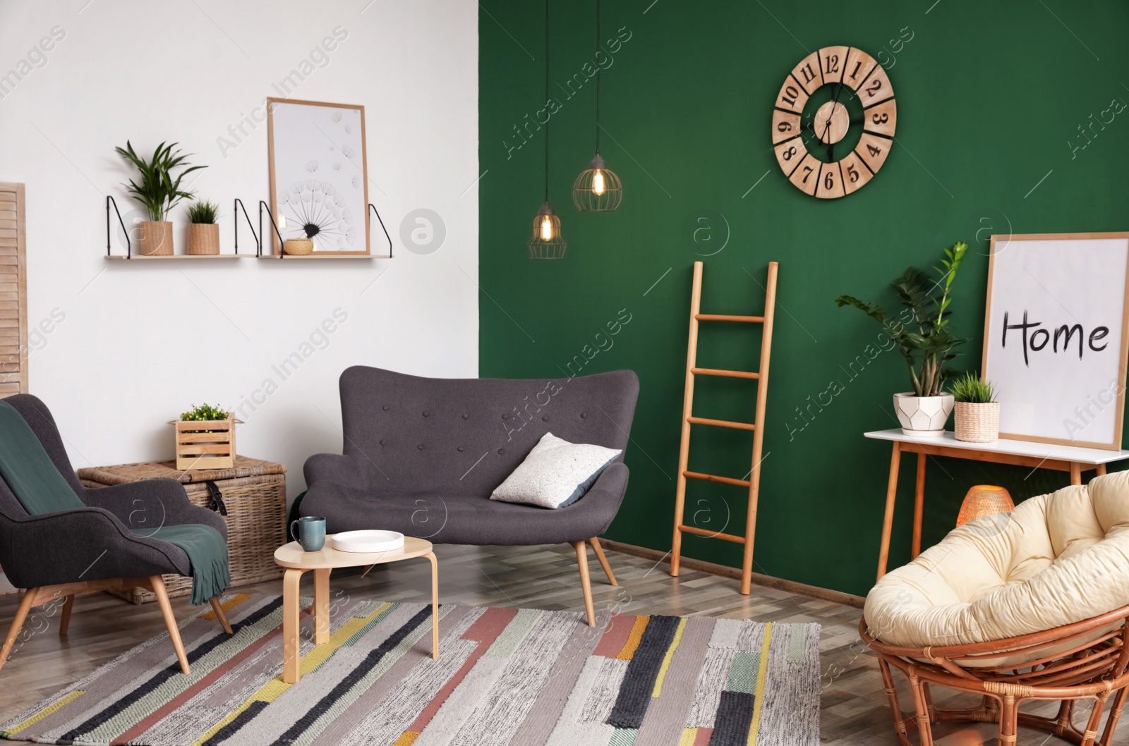 Photo of Modern living room interior stylish sofa near green wall