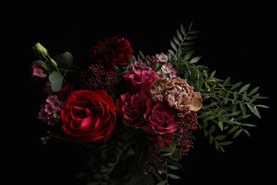 Beautiful bouquet of fresh flowers on dark background