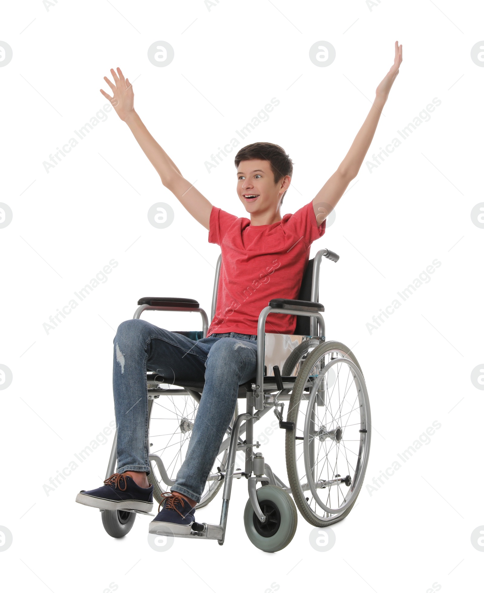 Photo of Emotional teen boy in wheelchair on white background