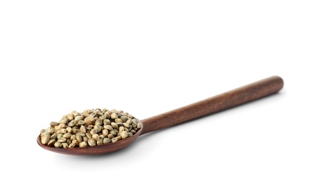 Photo of Spoon with hemp seeds on white background