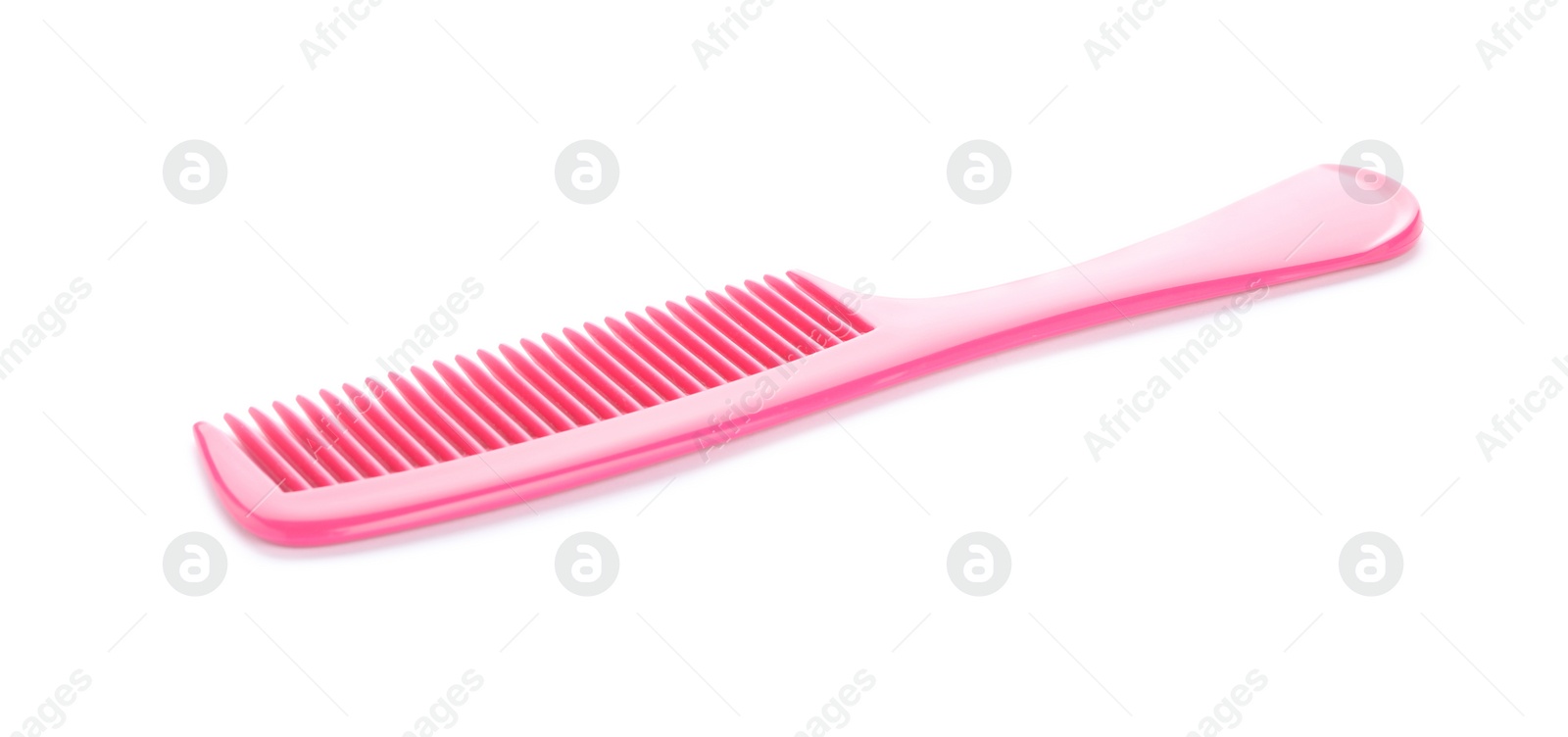 Photo of New pink hair comb isolated on white