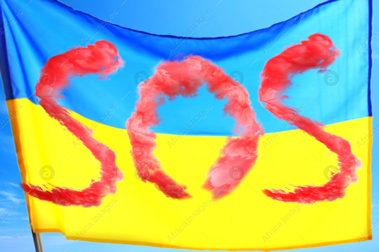 Image of Word SOS made of red smoke and national flag of Ukraine outdoors