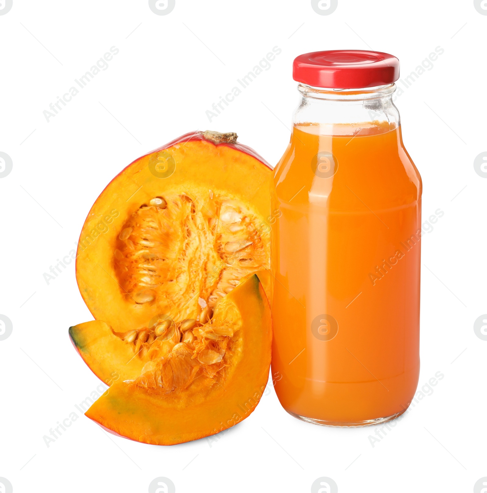 Photo of Glass bottle with pumpkin juice and fresh vegetable on white background