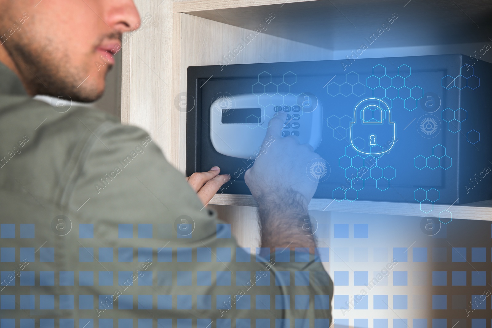 Image of Man opening black steel safe with electronic lock, closeup