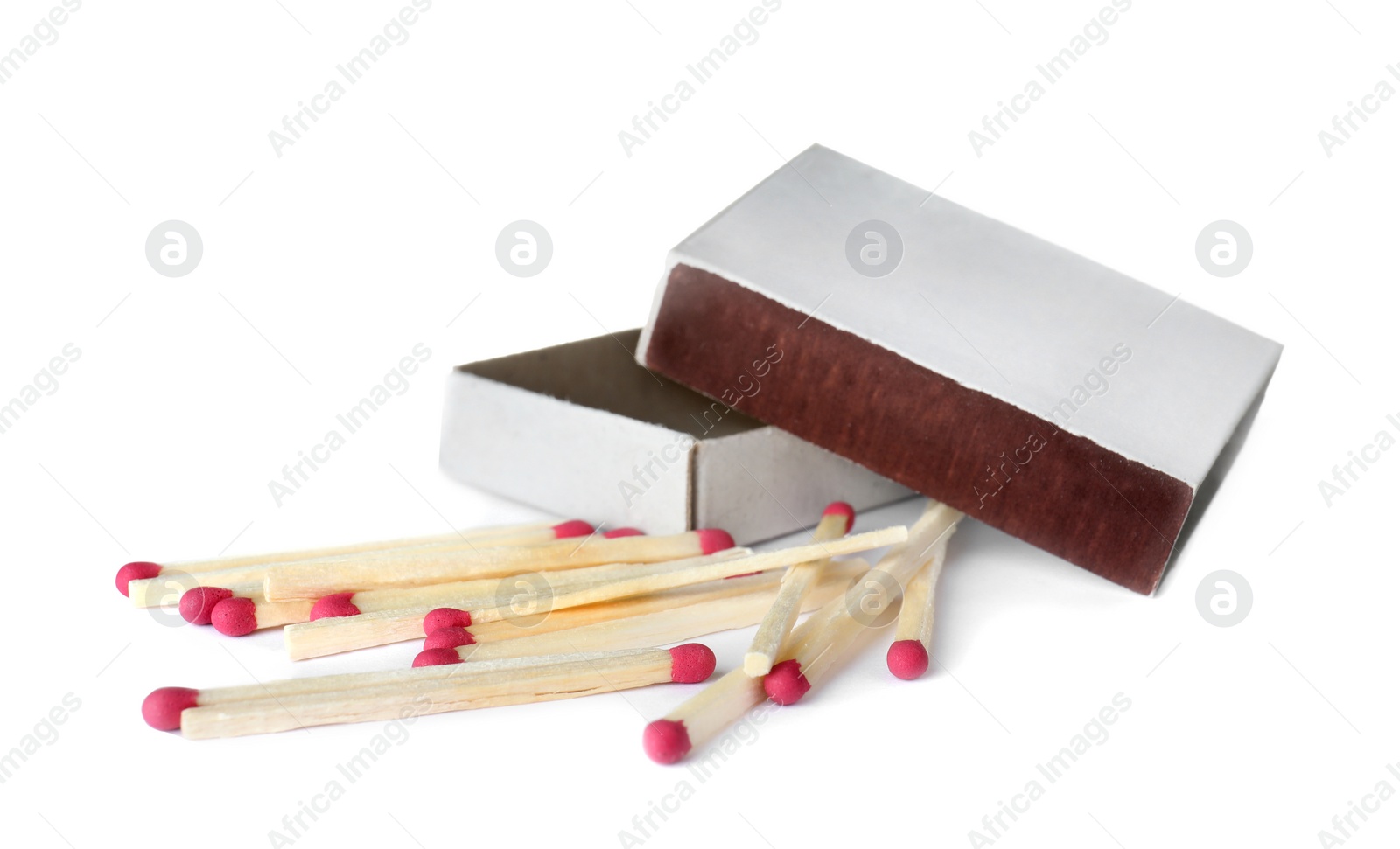 Photo of Cardboard box and matches on white background. Space for design