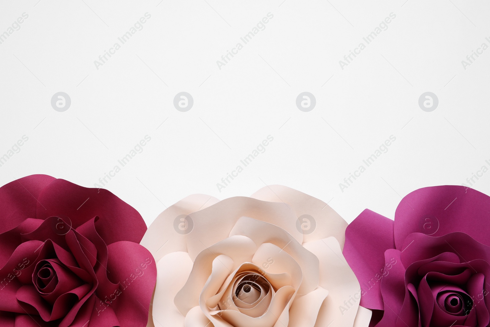 Photo of Different beautiful flowers made of paper on white background, top view