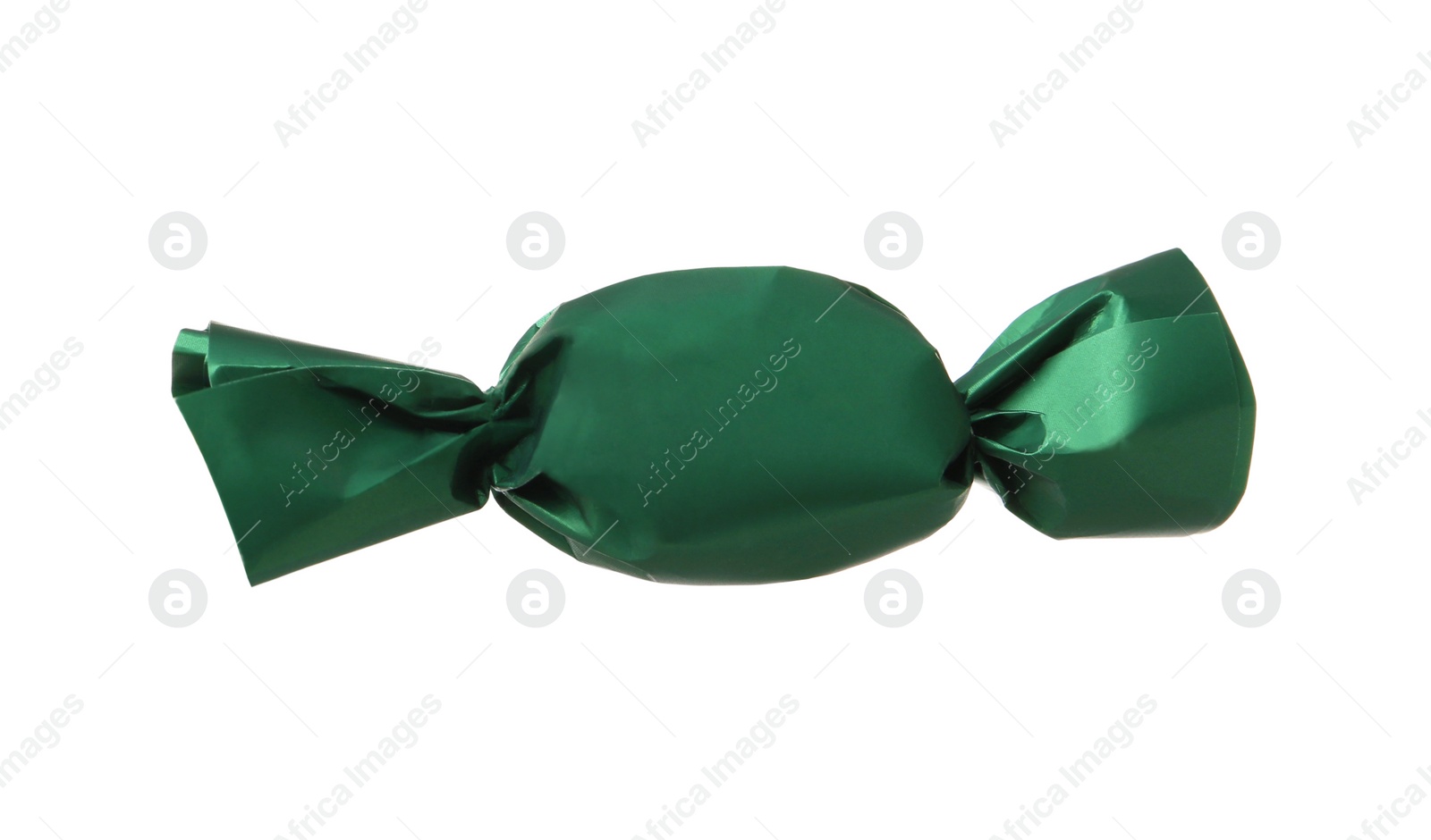 Photo of Delicious candy in dark green wrapper isolated on white