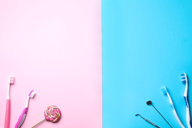 Photo of Flat lay composition with different toothbrushes on color background. Space for text