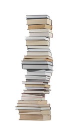 Photo of High stack of many different books isolated on white