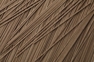 Uncooked buckwheat noodles (soba) as background, closeup