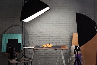 Photo of Photo studio with professional lighting equipment for shooting food