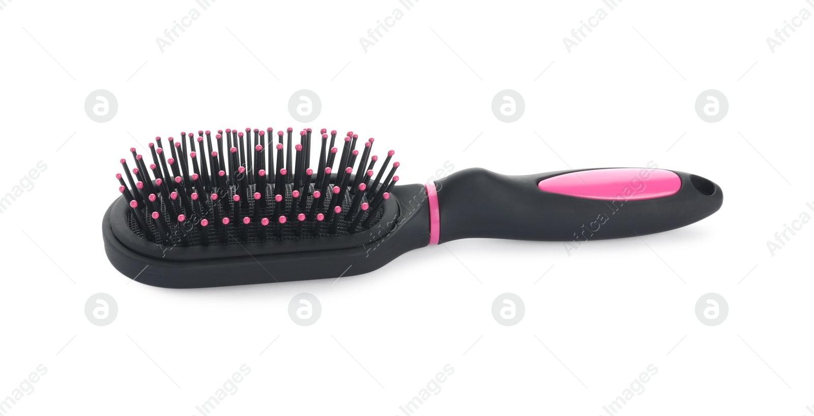 Photo of New modern hair brush isolated on white