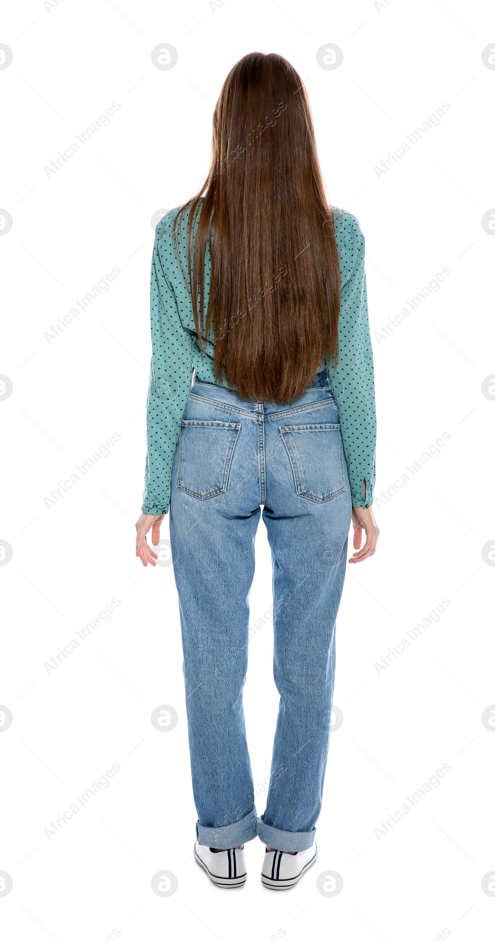 Photo of Young long haired woman posing on white background