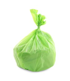 Photo of Green plastic garbage bag isolated on white