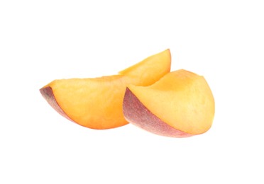 Photo of Slices of ripe peach isolated on white