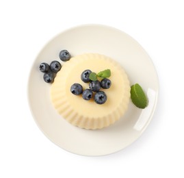 Delicious semolina pudding with blueberries isolated on white, top view