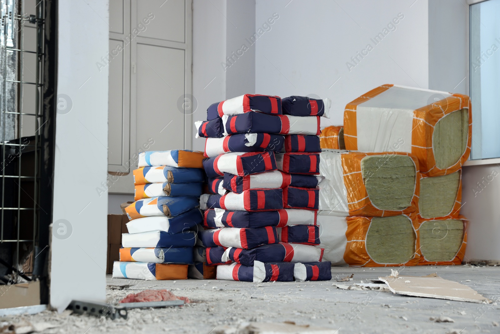 Photo of New building materials in room prepared for renovation