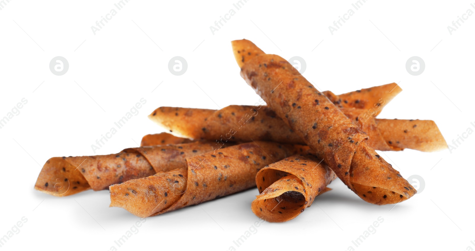 Photo of Delicious fruit leather rolls on white background