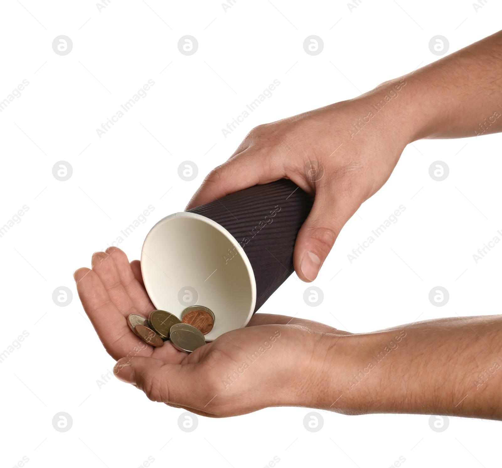 Photo of Poor man holding cup with coins on white background, closeup