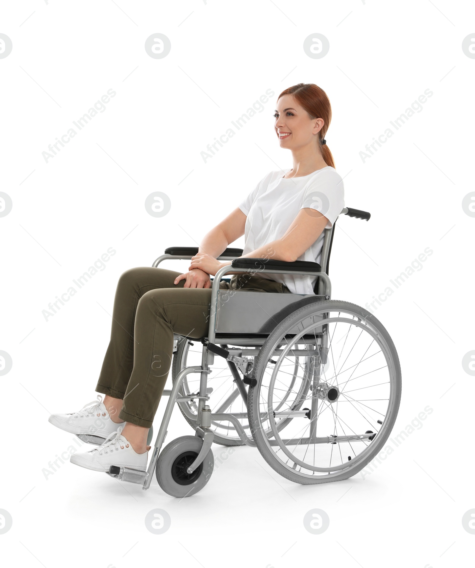 Photo of Beautiful woman in wheelchair isolated on white