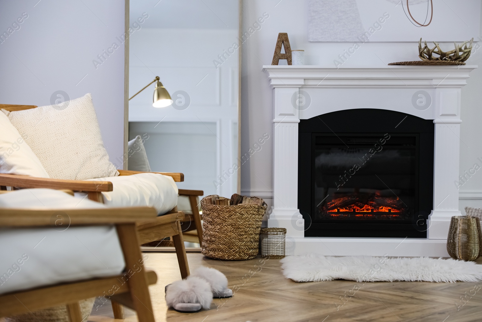 Photo of Beautiful living room interior with fireplace and armchairs