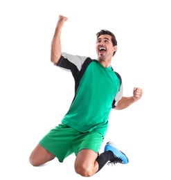 Young football player celebrating scoring of goal on white background