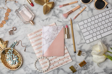 Photo of Flat lay composition with cosmetics and stylish accessories on light background. Blogger concept