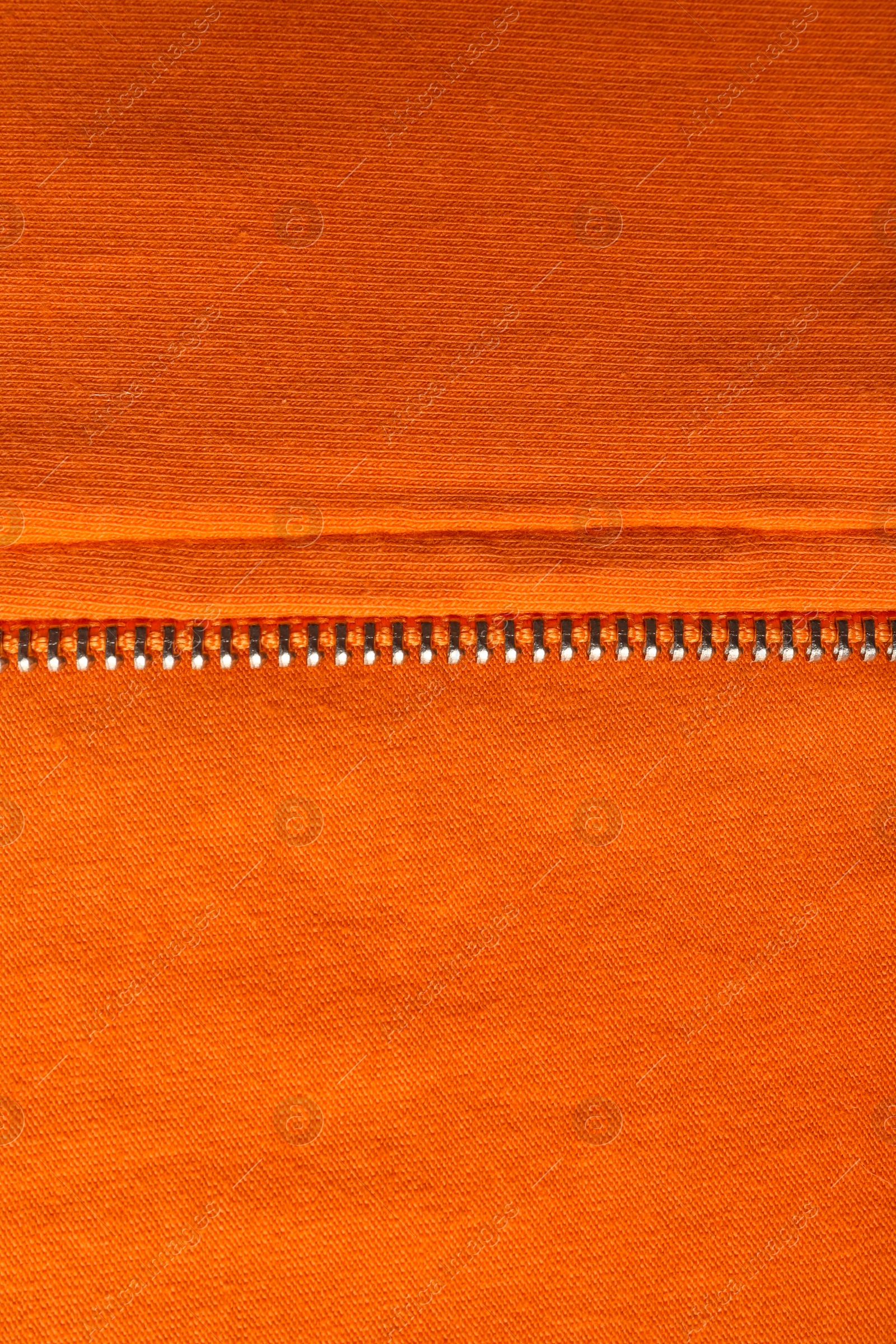 Photo of Texture of orange material as background, closeup