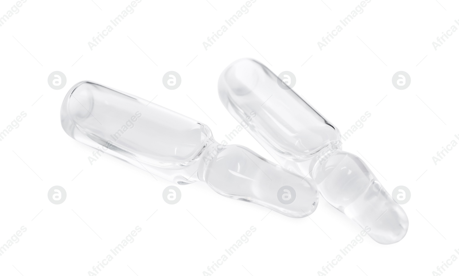 Photo of Glass ampoules with pharmaceutical product on white background