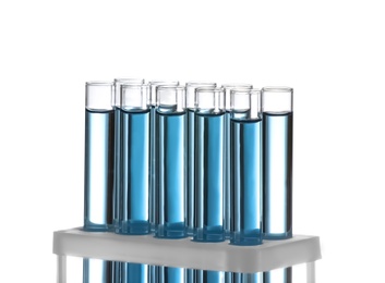 Photo of Test tubes with blue liquid isolated on white. Laboratory glassware