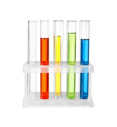 Photo of Test tubes with colorful liquids in stand isolated on white