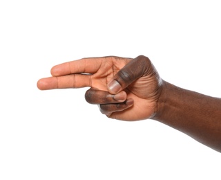 African-American man showing shoot gesture on white background, closeup