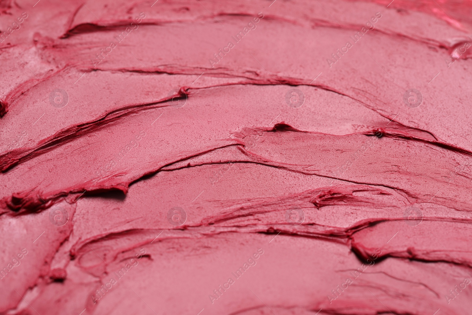 Photo of Texture of red lipstick as background, closeup