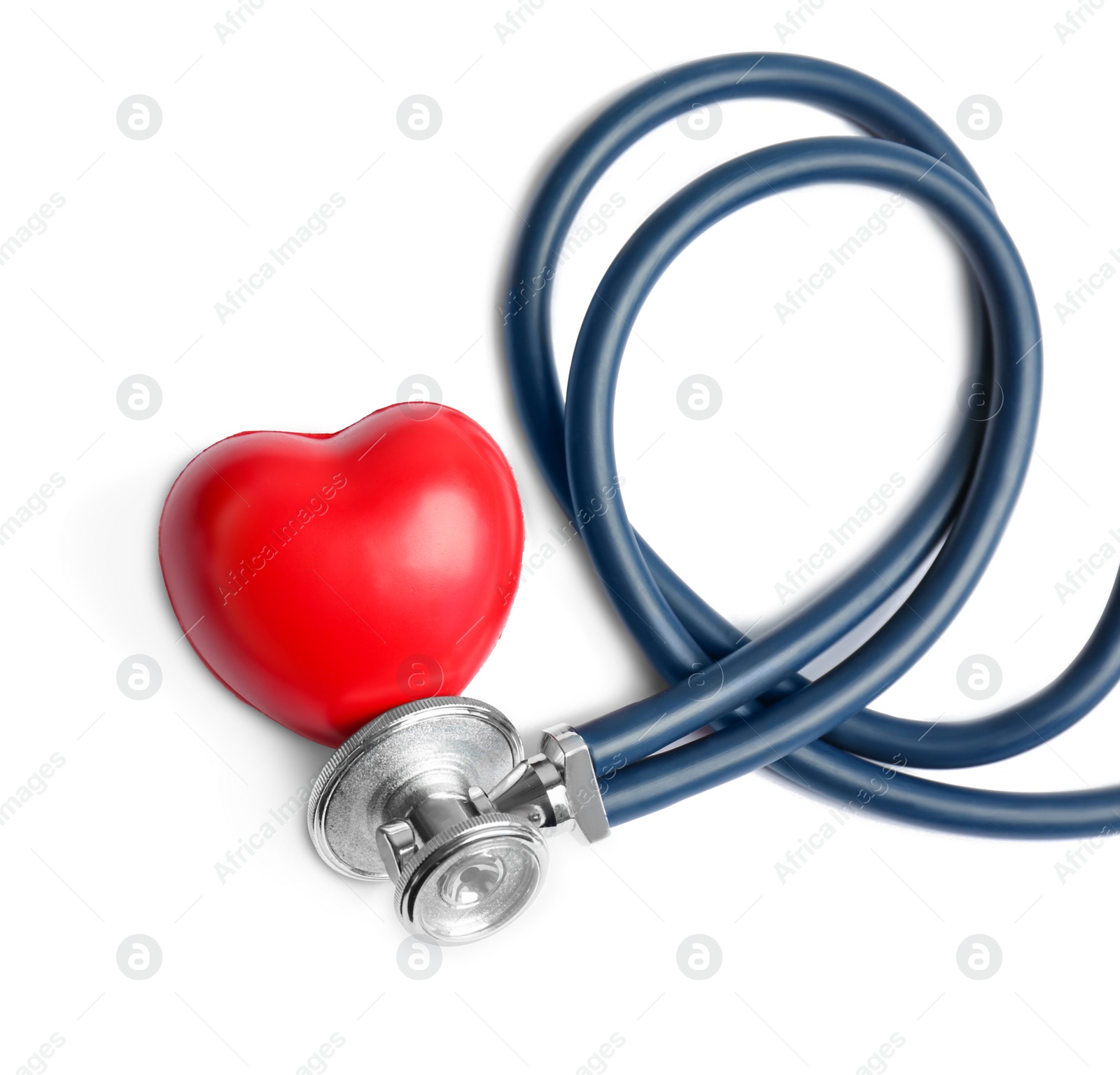 Photo of Stethoscope and heart model on light background, top view. Medical equipment