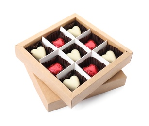 Photo of Tasty heart shaped chocolate candies in box isolated on white. Valentine's day celebration