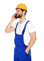 Photo of Professional repairman in uniform talking on smartphone against white background