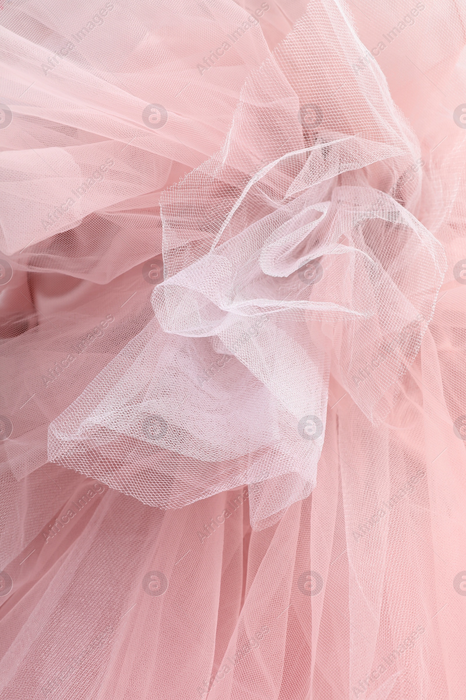 Photo of Beautiful tulle fabric as background, closeup view