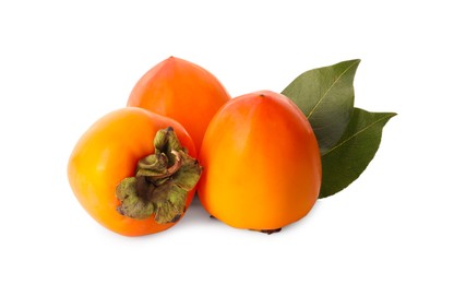 Delicious ripe juicy persimmons on white background