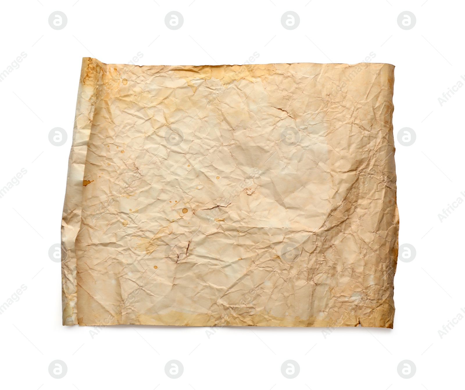 Photo of Sheet of old parchment paper isolated on white, top view. Space for design