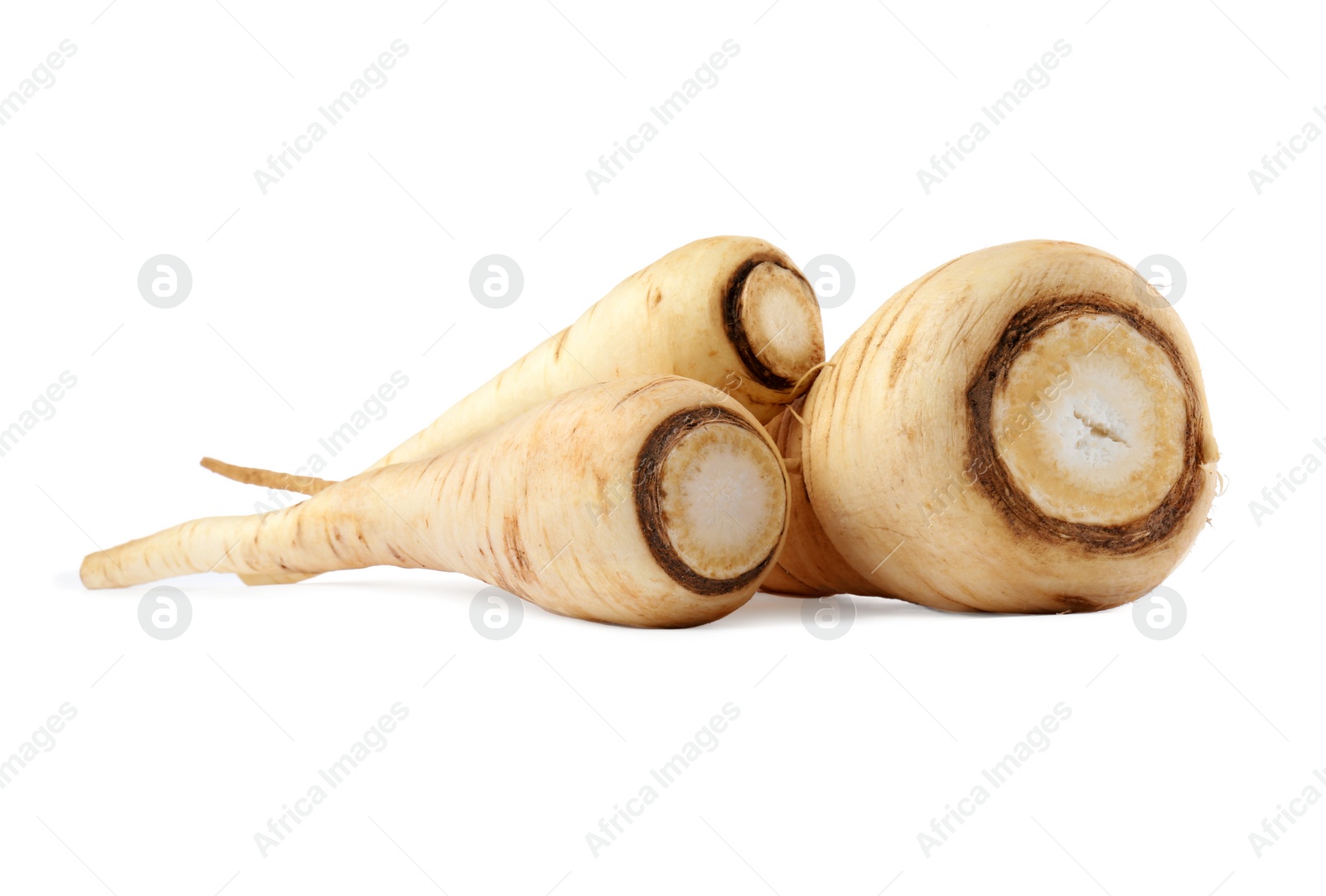 Photo of Tasty fresh ripe parsnips on white background