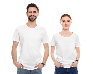 Photo of Young people in t-shirts on white background. Mock up for design