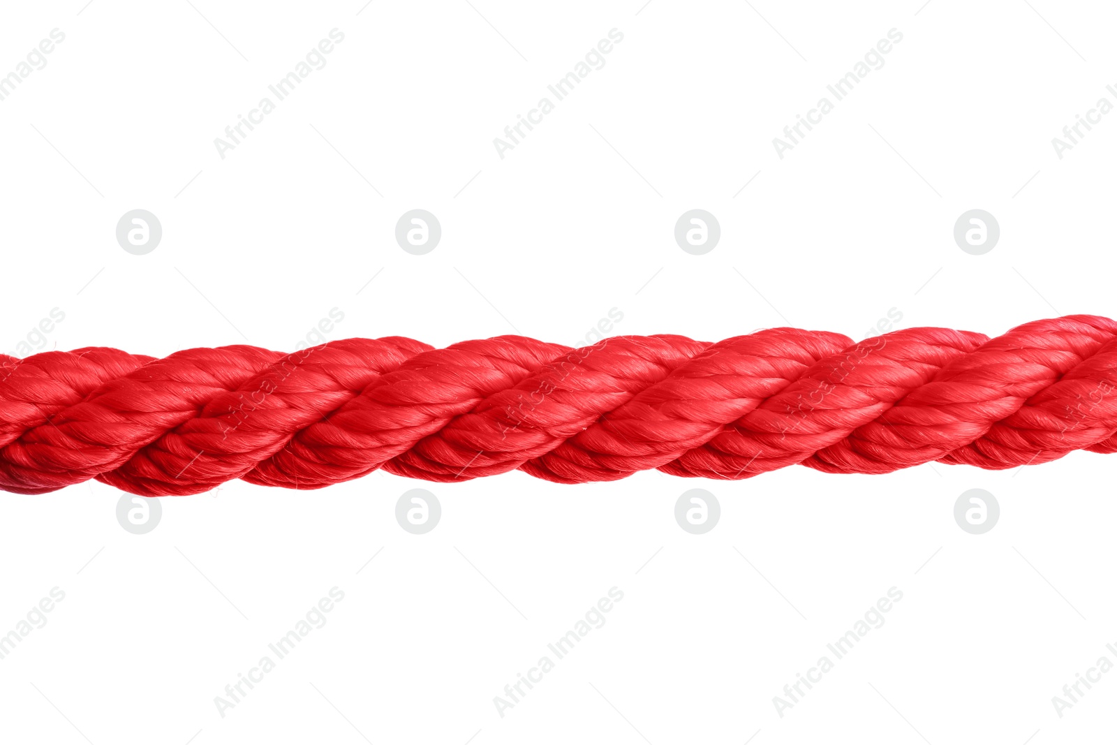 Photo of Strong red climbing rope on white background