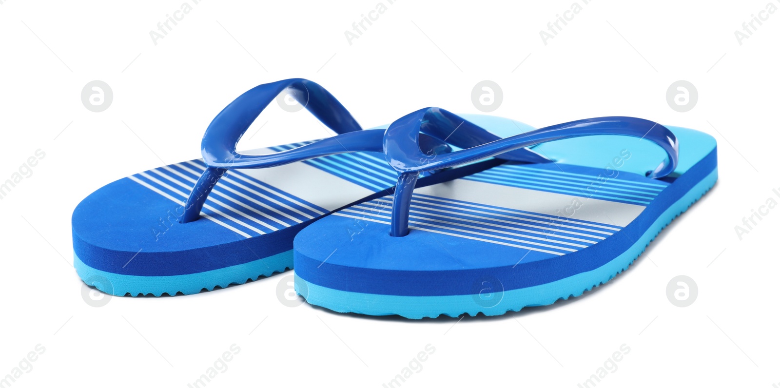 Photo of Pair of bright flip flops isolated on white