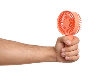 Photo of Man with portable fan on white background, closeup. Summer heat