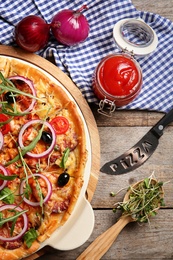 Photo of Flat lay composition with tasty homemade pizza on table