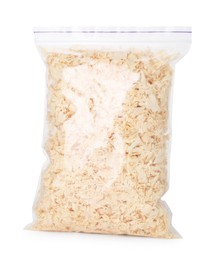 Natural sawdust in zip bag isolated on white